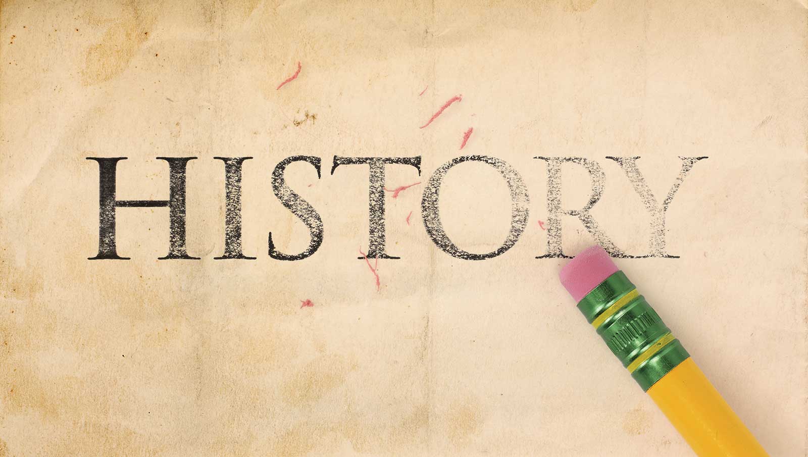 Vintage 'HISTORY' text on aged paper, showcasing a pink eraser from a yellow pencil for plumbing maintenance tips.
